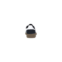 Image 4 : Vue de dessous de la semelle en gomme caramel de la basket Adidas Spezial femme avec logo Adidas moulé — Delvale