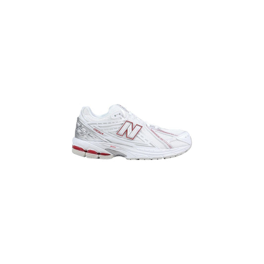 New Balance 1906R blanche avec touches rouges et détails argentés vue de profil extérieur