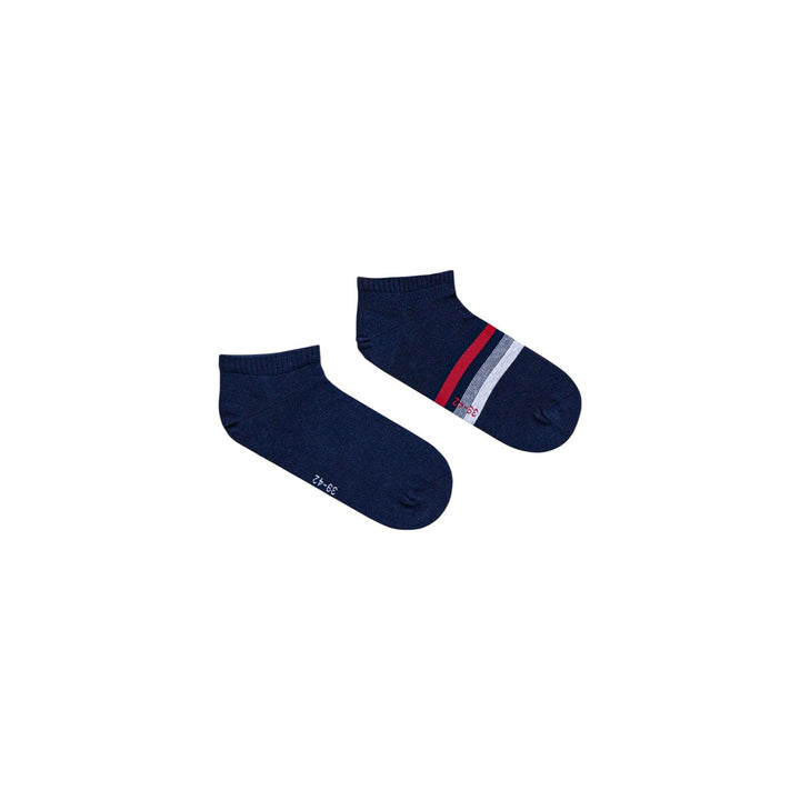 Image 1 : Paire de chaussettes Tommy Hilfiger homme modèle sneaker bleu marine avec rayures tricolores rouge, blanc et gris sur le côté — Delvale