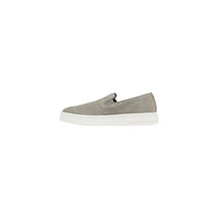 Vue latérale du slip-on Armani Exchange homme en cuir suédé vert avec semelle blanche