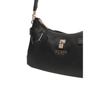 Image 2 : Vue de face du sac à main Guess femme noir, fermeture zip et boucles dorées latérales — Delvale