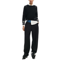 Image 2 : Détail du motif imprimé du pull Desigual femme noir, texture viscose polyamide — delvale