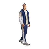 Image 3 : Détail tissu technique pantalon sport Under Armour homme bleu — Delvale