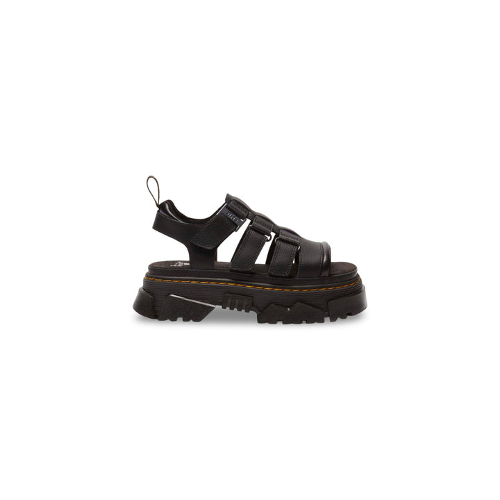 Image 1 : Sandales plateforme Dr. Martens Mattison en cuir noir, vue de profil gauche, brides ajustables et semelle crantée épaisse avec surpiqûres jaunes — Delvale