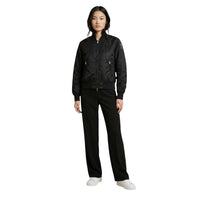 Image 2 : Veste Blauer femme noire avec poches frontales et encolure ronde, détail du style — delvale