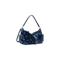 Image 2 : Vue détaillée du sac hobo Desigual montrant les appliqués floraux texturés et les finitions œillets — delvale