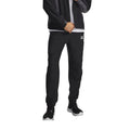 Pantalon technique Under Armour homme noir et gris