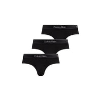 Image 7 : Lot de 3 slips Calvin Klein Underwear homme noirs, vue légèrement en biais sur fond blanc épuré — Delvale