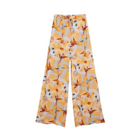 Image 2 : Pantalon Desigual orange fleuri, détail de l'imprimé et de la coupe féminine — Delvale