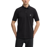 Polo Armani Exchange homme noir piqué logo AX — vue de face fond blanc — Delvale