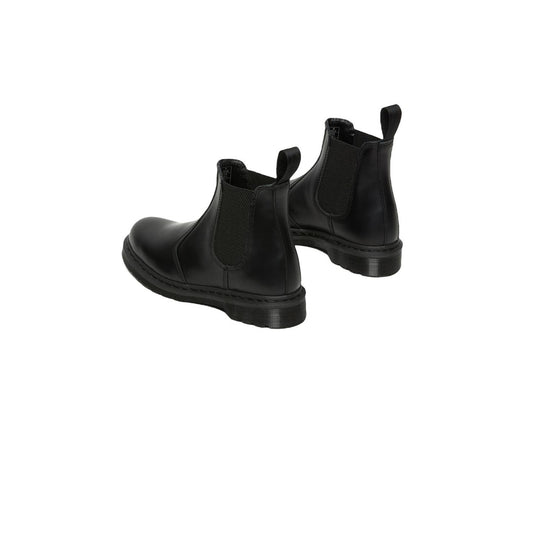 Paire de Dr. Martens 2976 Mono noires, vue arrière trois-quarts, bottines Chelsea en cuir noir.
