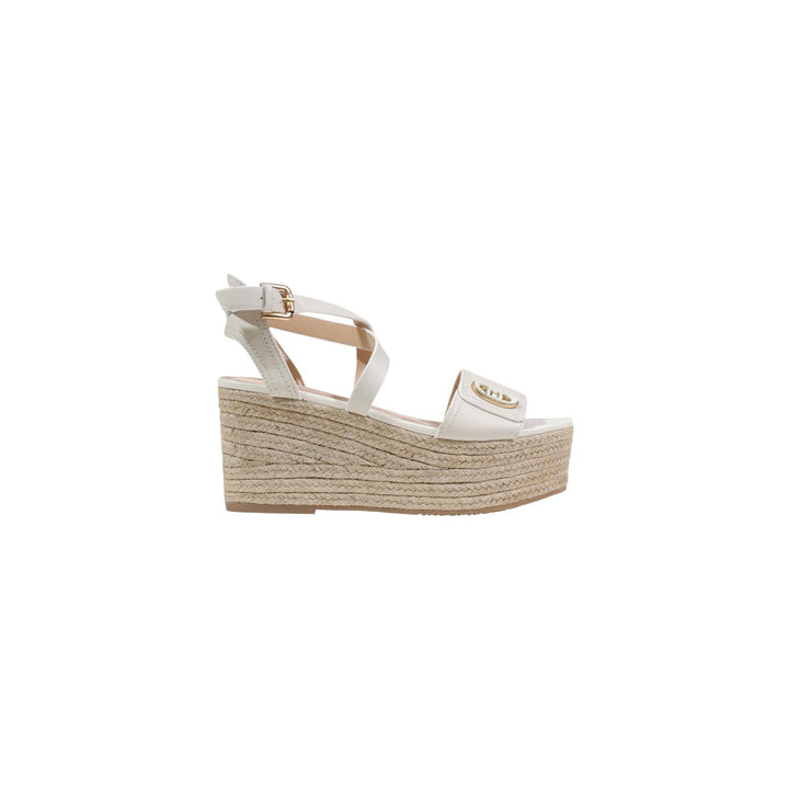 Image 1 : Sandale compensée Liu Jo femme blanc ivoire, plateforme corde tressée haute et logo doré sur la bride avant, vue de profil — Delvale