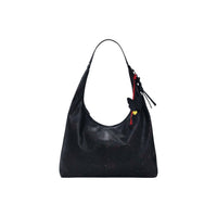 Image 1 : Sac hobo Desigual femme en polyester noir avec micro-perforations effet constellation et breloques colorées papillon, cœur jaune et lanières rouges sur le zip — Delvale