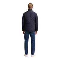 Image 3 : Veste Barbour homme bleue portée, look casual-chic masculin saison froide — Delvale