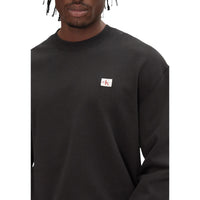 Image 3 : Vue d'ensemble sweat col rond Calvin Klein Jeans noir coupe décontractée homme — Delvale