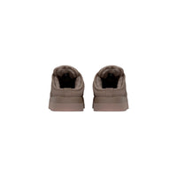 Image 5 : Gros plan sur le trèfle Adidas en relief tonal et les lacets plats coordonnés des mules Campus 00S femme — Delvale