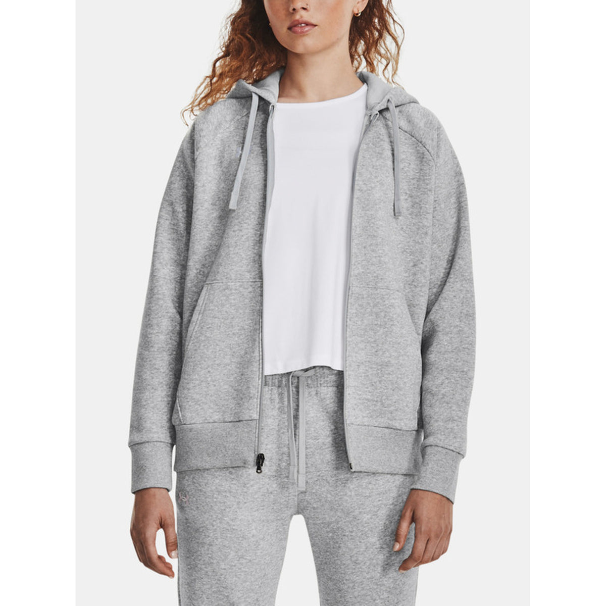 Image 4 : Sweat zippé à capuche Under Armour femme noir, détail de la capuche et finitions premium — Delvale