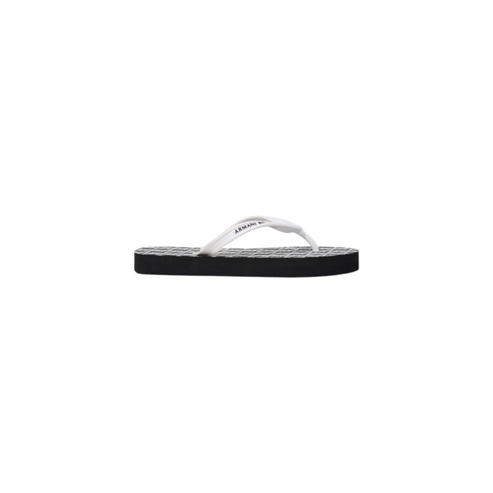 Image 1 : Tongs Armani Exchange femme noires avec semelle caoutchouc et bride synthétique — delvale