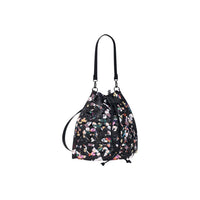Image 2 : Vue détaillée du sac hobo Desigual montrant les appliqués floraux texturés et les œillets argentés — delvale