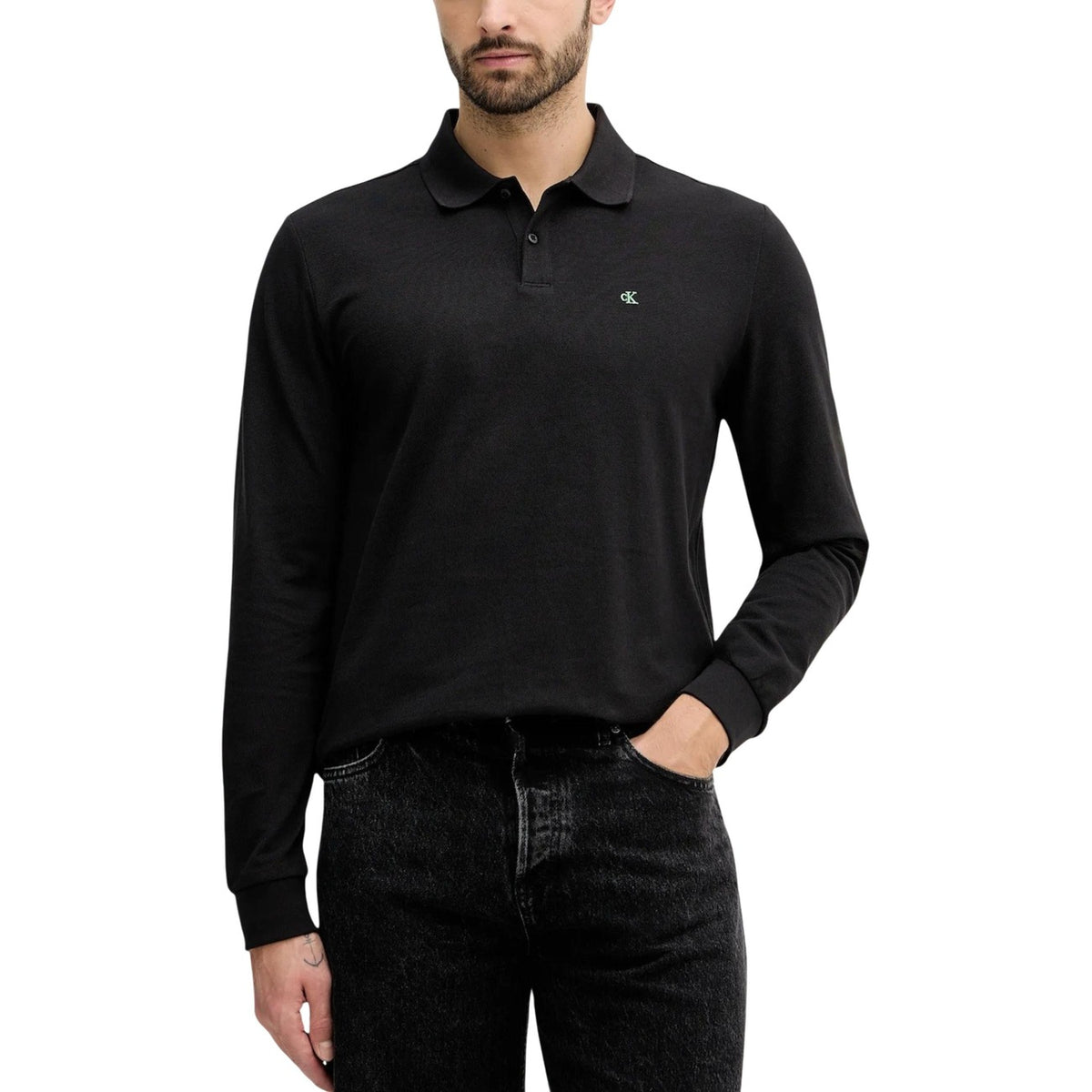 Image 1 : Polo manche longue noir homme Calvin Klein Jeans, vue face, col polo et boutons — delvale